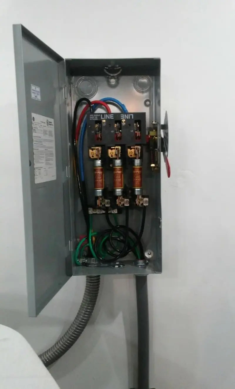 Three-phase disconnect switch installed for Smoke Detector Installation in North Wales